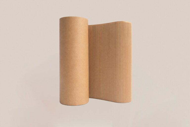 WaveBag ROLL corrugated cushioning paper unrolled on a neutral background