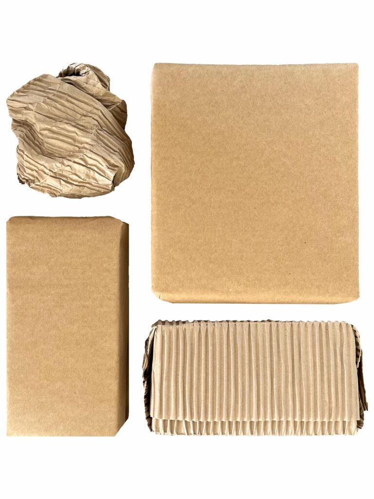 WaveBag WRAP corrugated paper sheets wrapped around boxes, with a crumpled sheet, seen from above